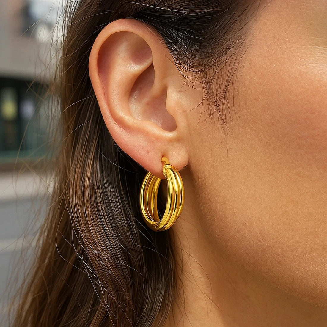 14K geelgouden in elkaar grijpende medium Trinity-oorbellen