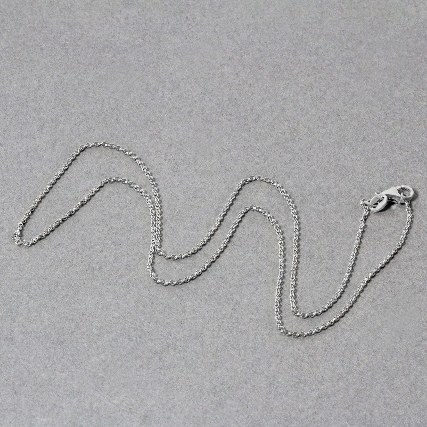 14k witgouden ovale kabelschakelketting (1,20 mm)