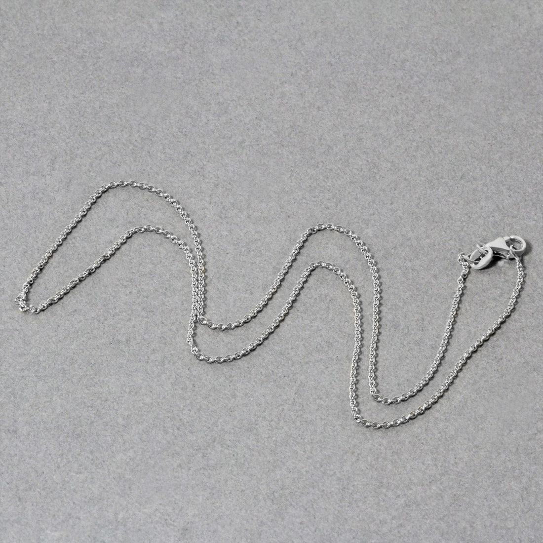 14k witgouden ovale kabelschakelketting (1,20 mm)