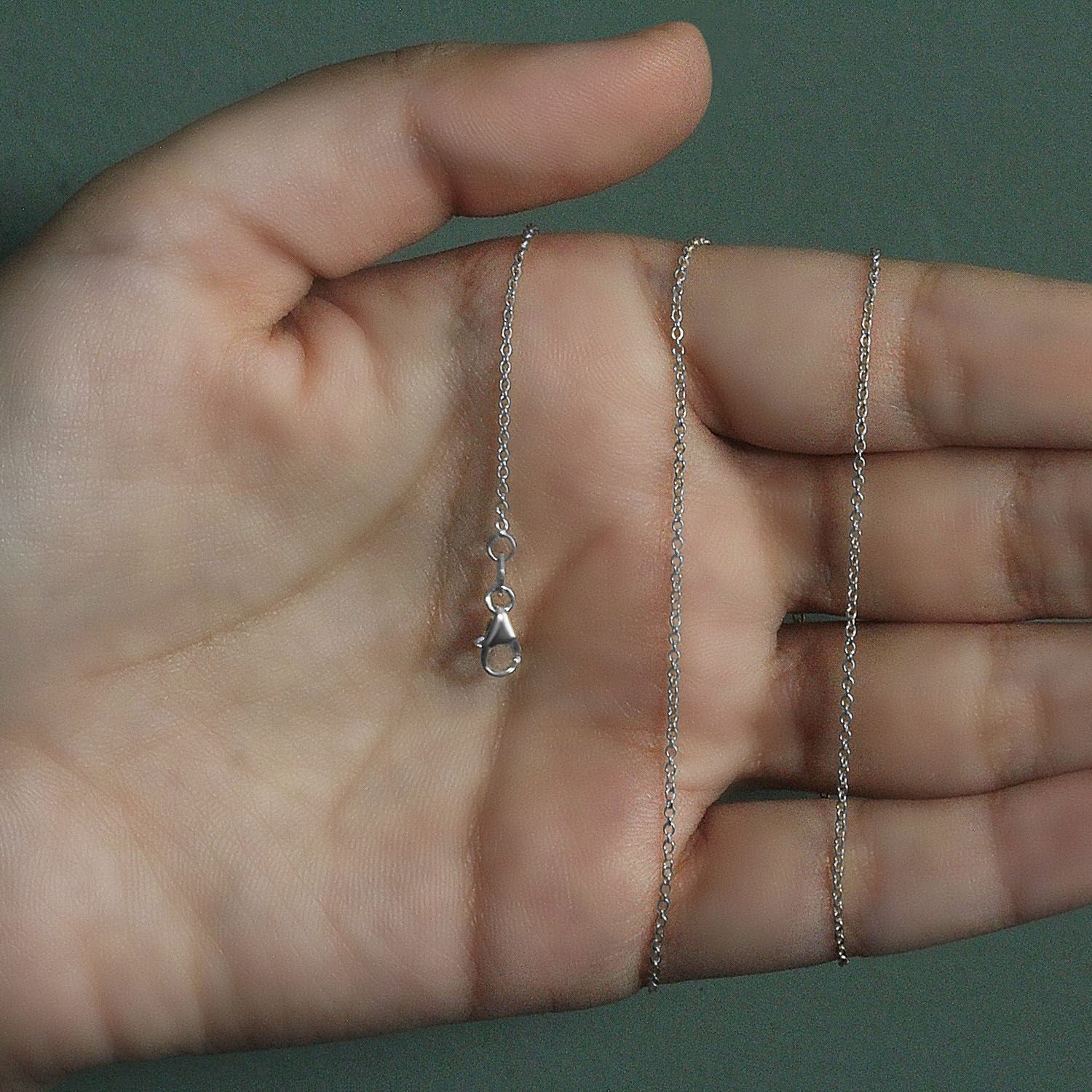 14k witgouden ovale kabelschakelketting (1,20 mm)