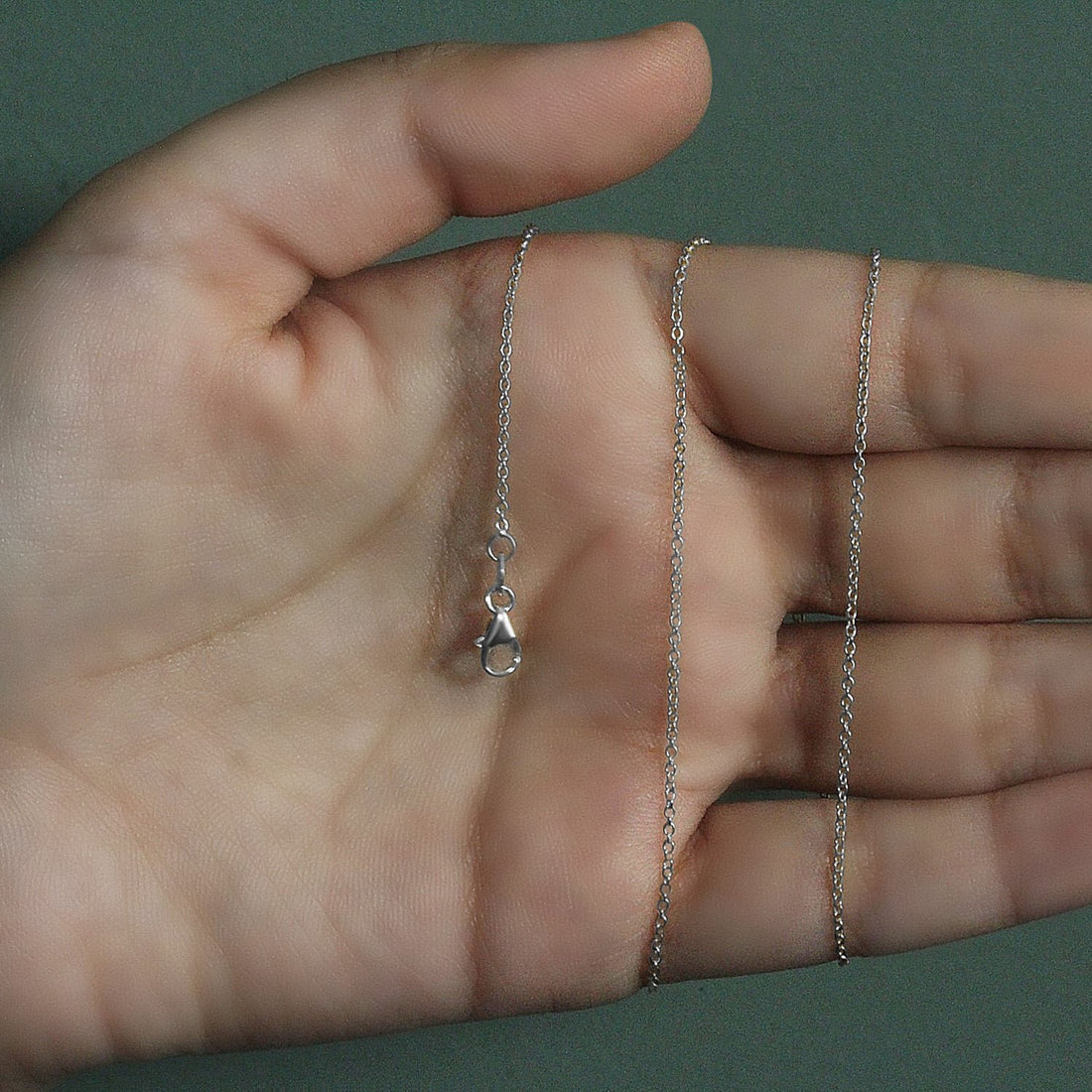 14k witgouden ovale kabelschakelketting (1,20 mm)