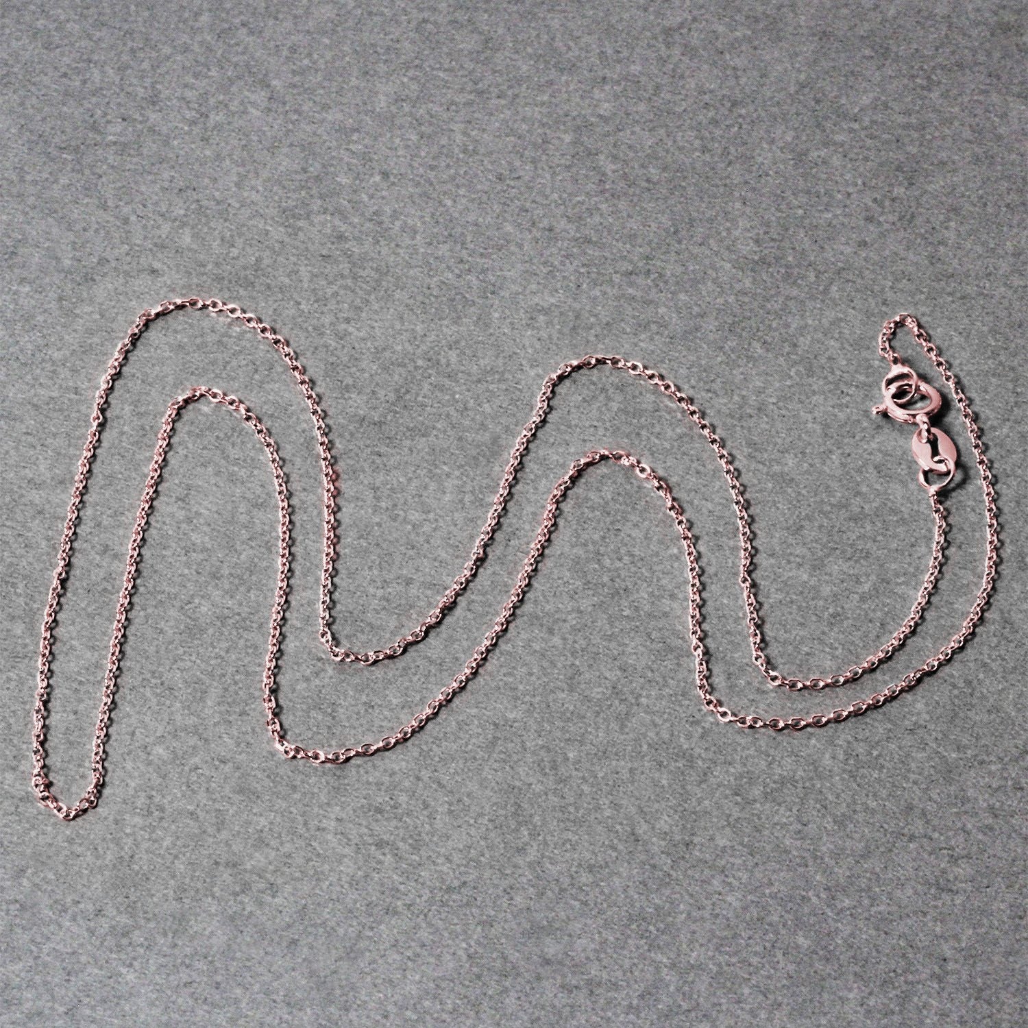 14k roze gouden kabelschakelketting met diamantslijpsel (0,87 mm)