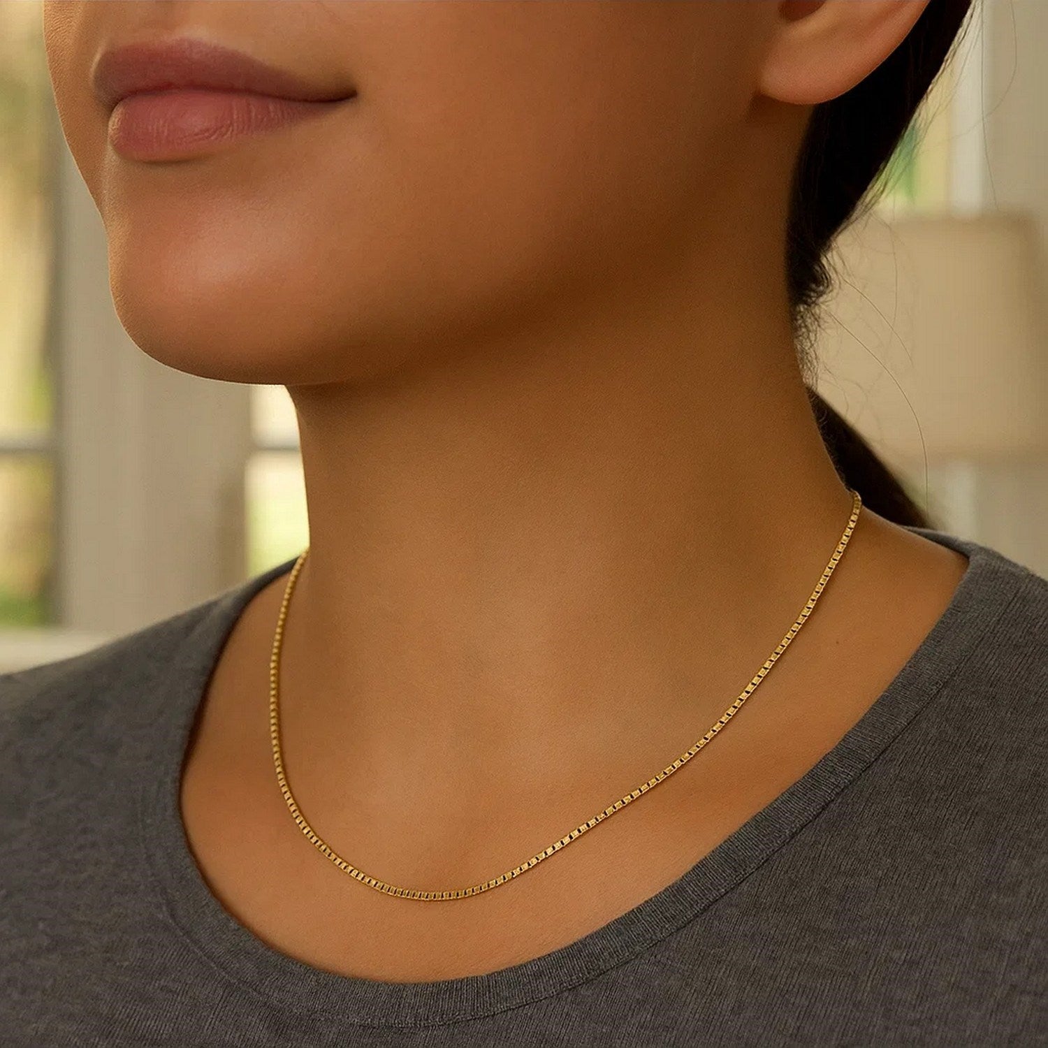 Chaîne classique en or jaune 14 carats (0,60 mm)