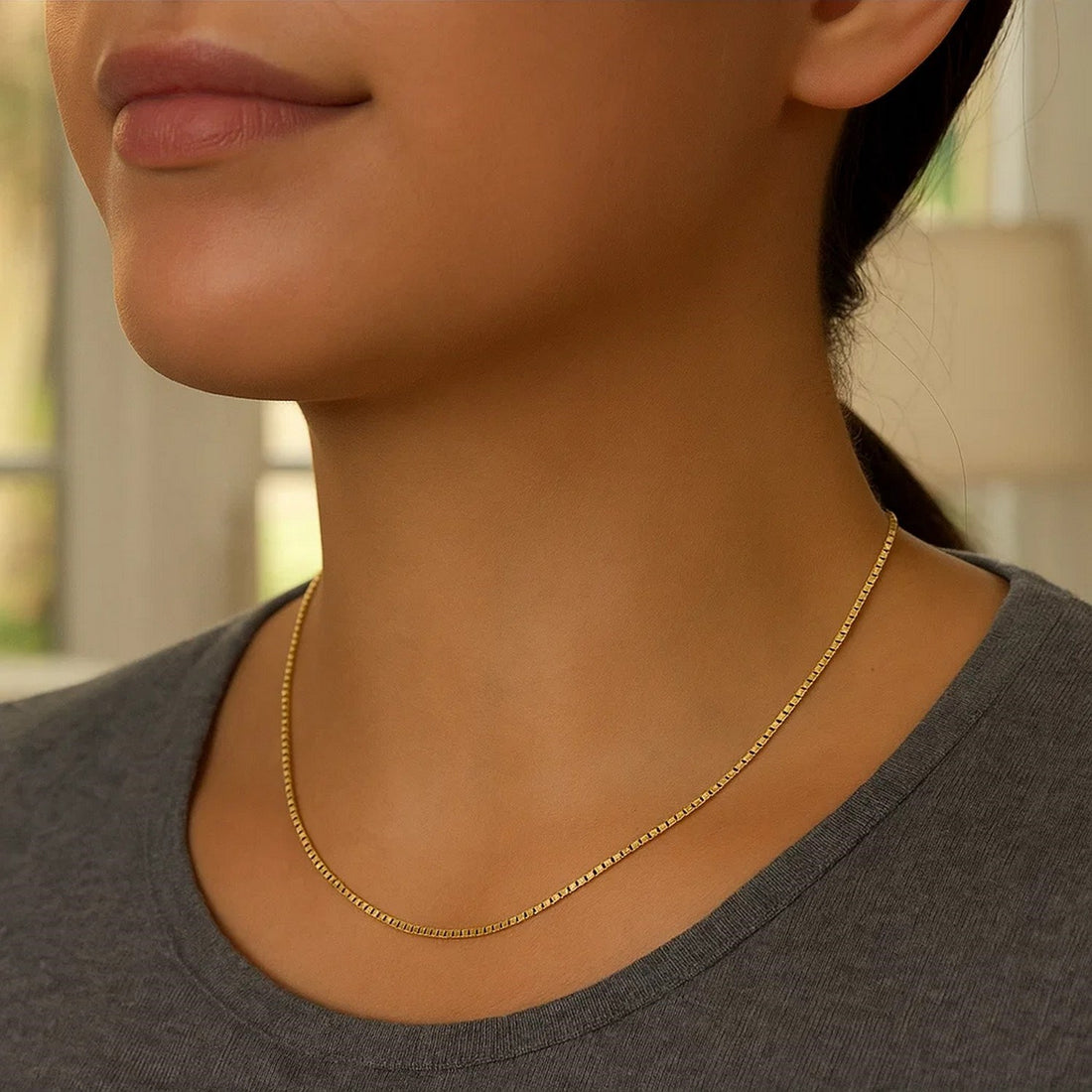 Chaîne classique en or jaune 14 carats (0,60 mm)