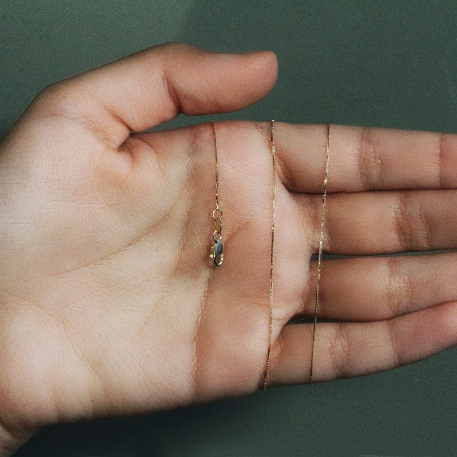 Chaîne classique en or jaune 14 carats (0,60 mm)