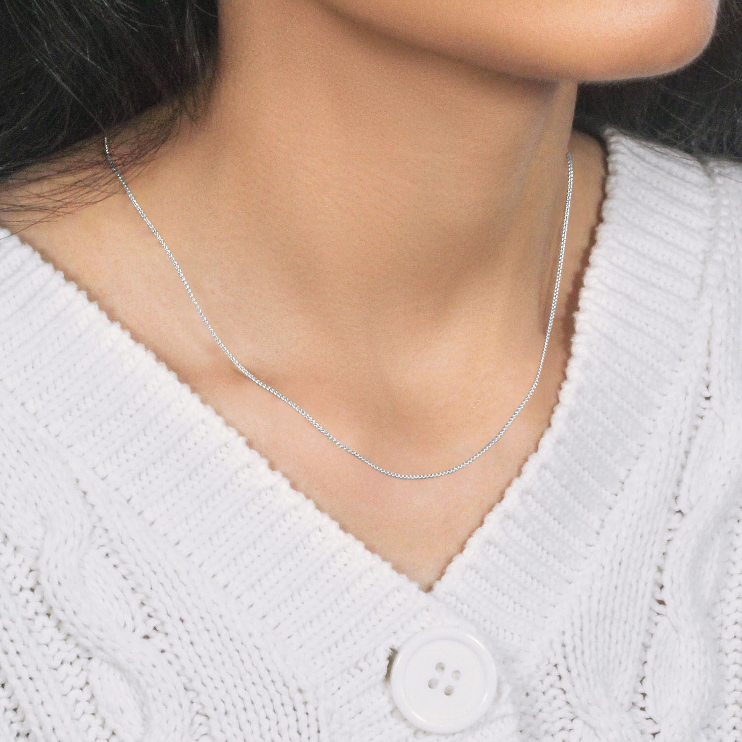 Chaîne en or blanc 14 carats à mailles rondes (1,00 mm)