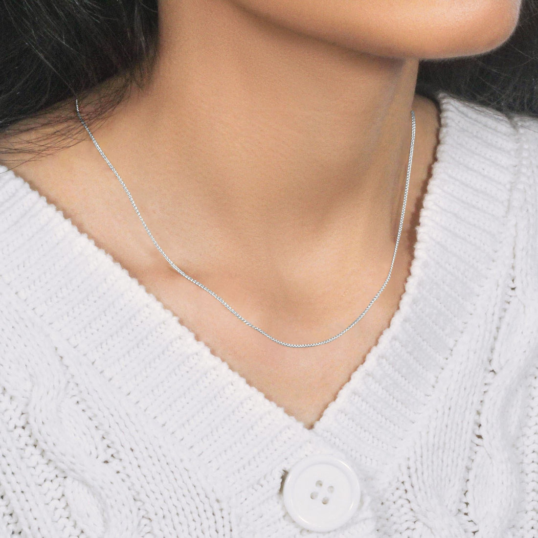 Chaîne en or blanc 14 carats à mailles rondes (1,00 mm)