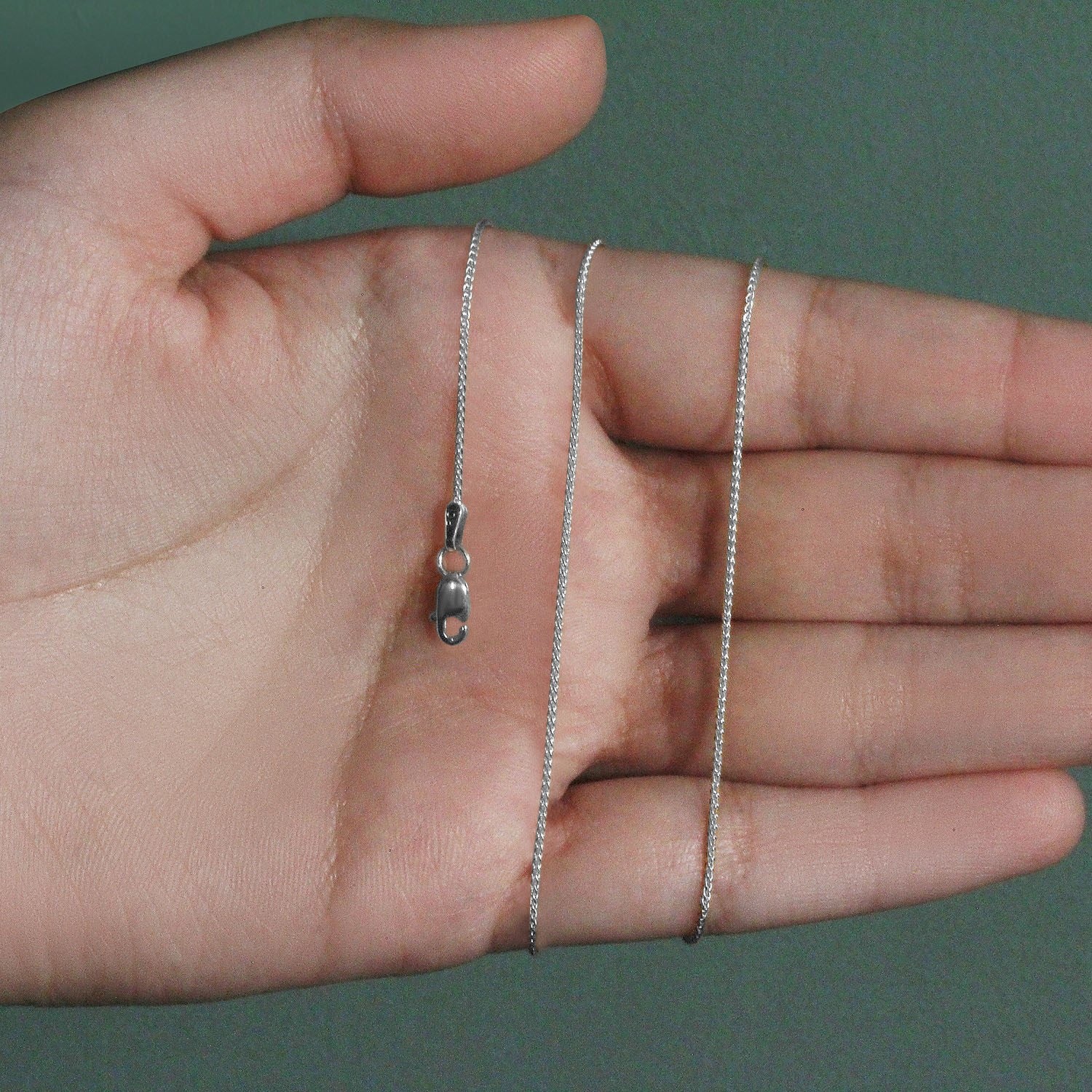 Chaîne en or blanc 14 carats à mailles rondes (1,00 mm)