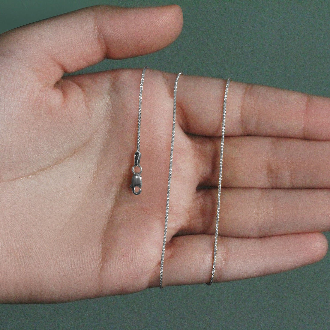 Chaîne en or blanc 14 carats à mailles rondes (1,00 mm)