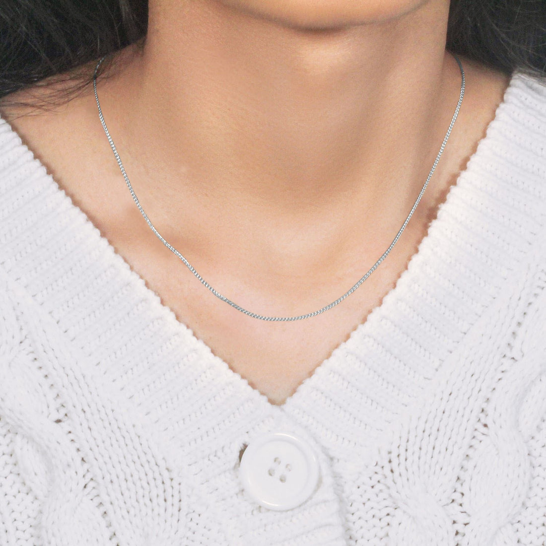 Chaîne en or blanc 14 carats à mailles rondes (1,00 mm)