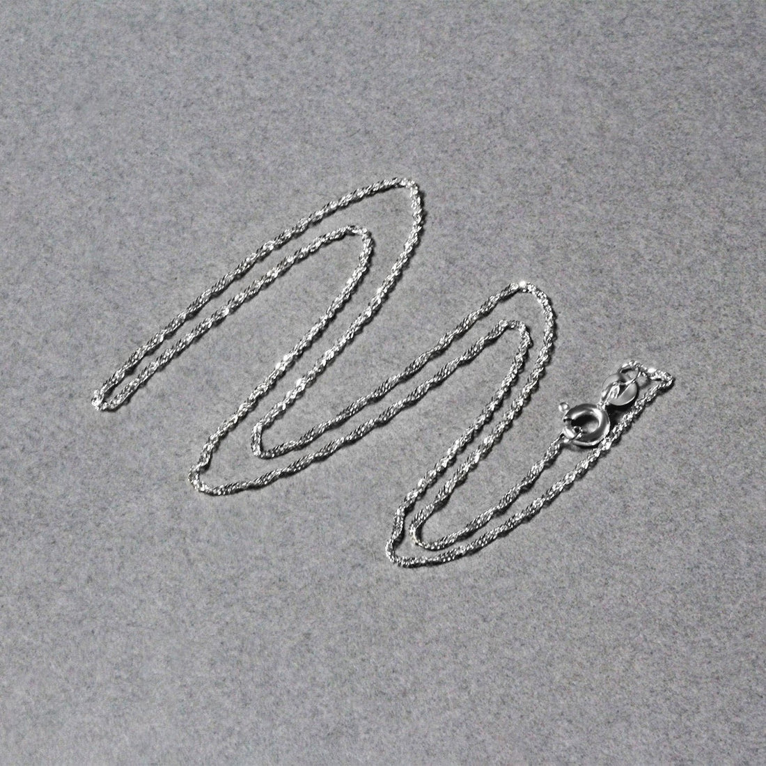 Chaîne Singapour en or blanc 14 carats (1,10 mm)