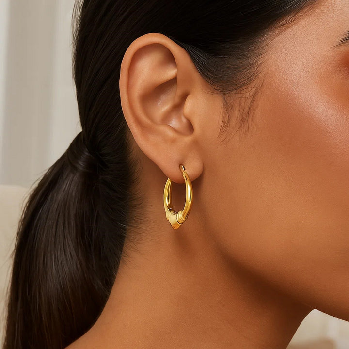 Medium Heart Hoop Earrings in 14K Yellow Gold