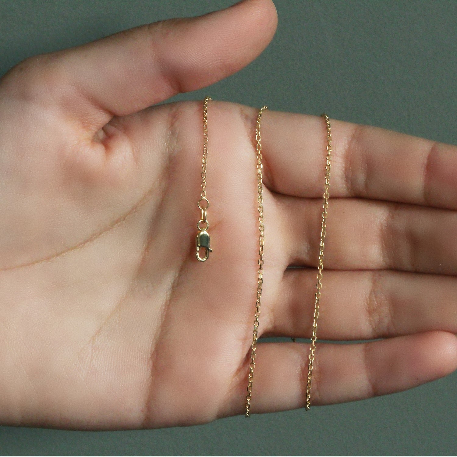 14k geelgouden kabelschakelketting met diamantslijpsel (1,30 mm)