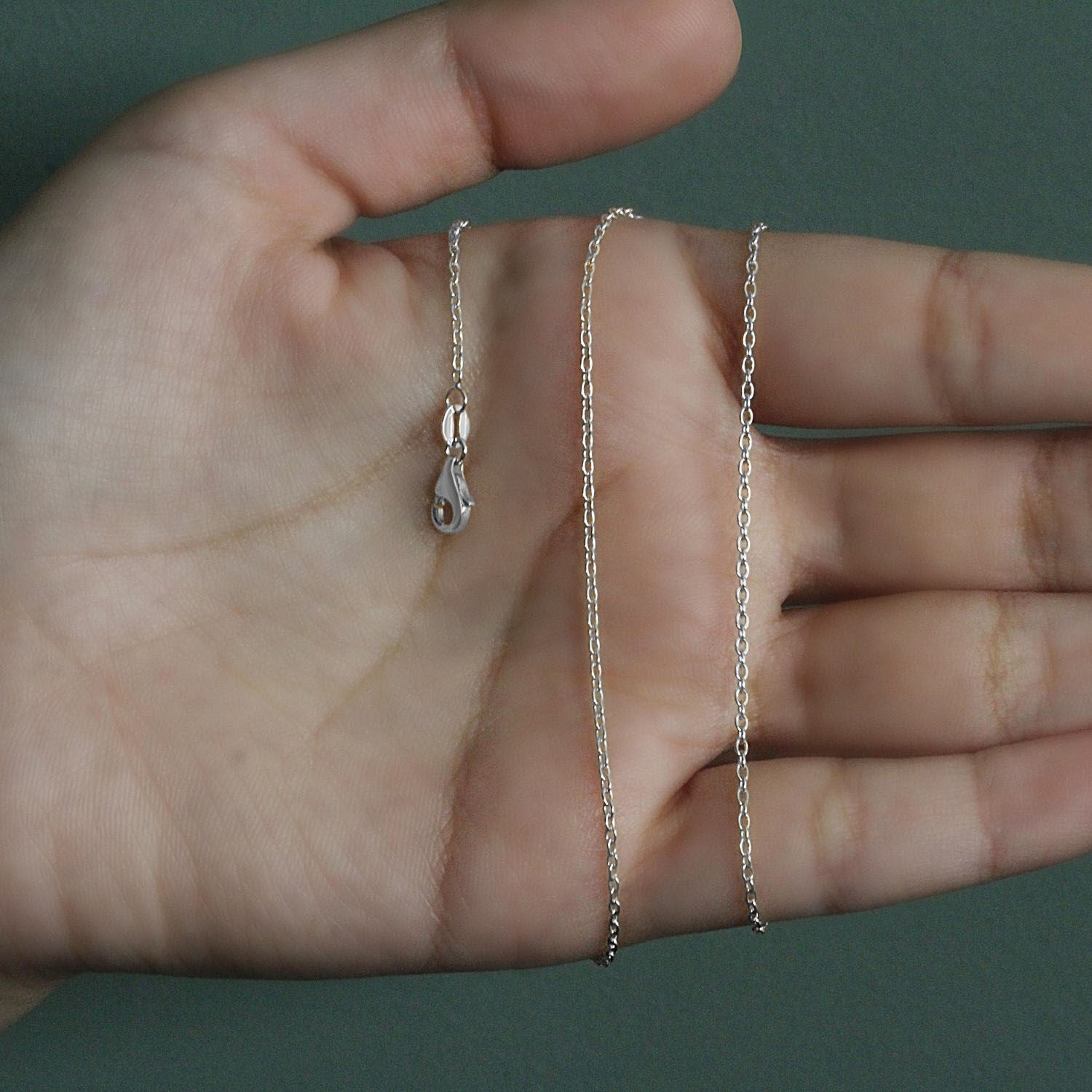 14k witgouden ovale kabelschakelketting (1,50 mm)