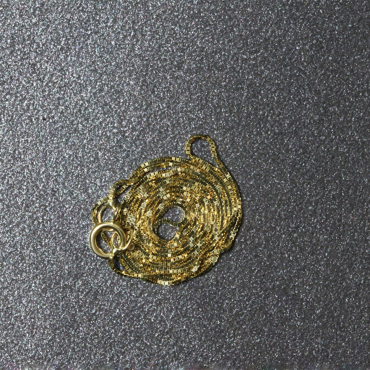 Chaîne classique en or jaune 14 carats (0,45 mm)