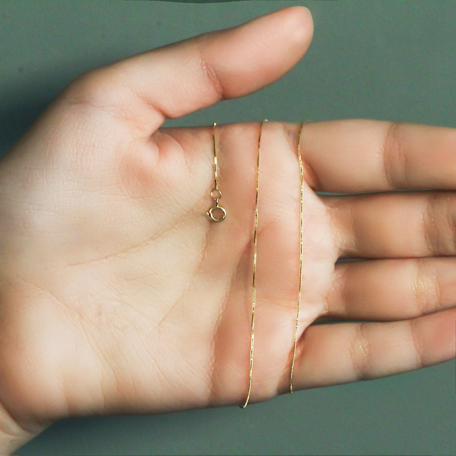 Chaîne classique en or jaune 14 carats (0,45 mm)