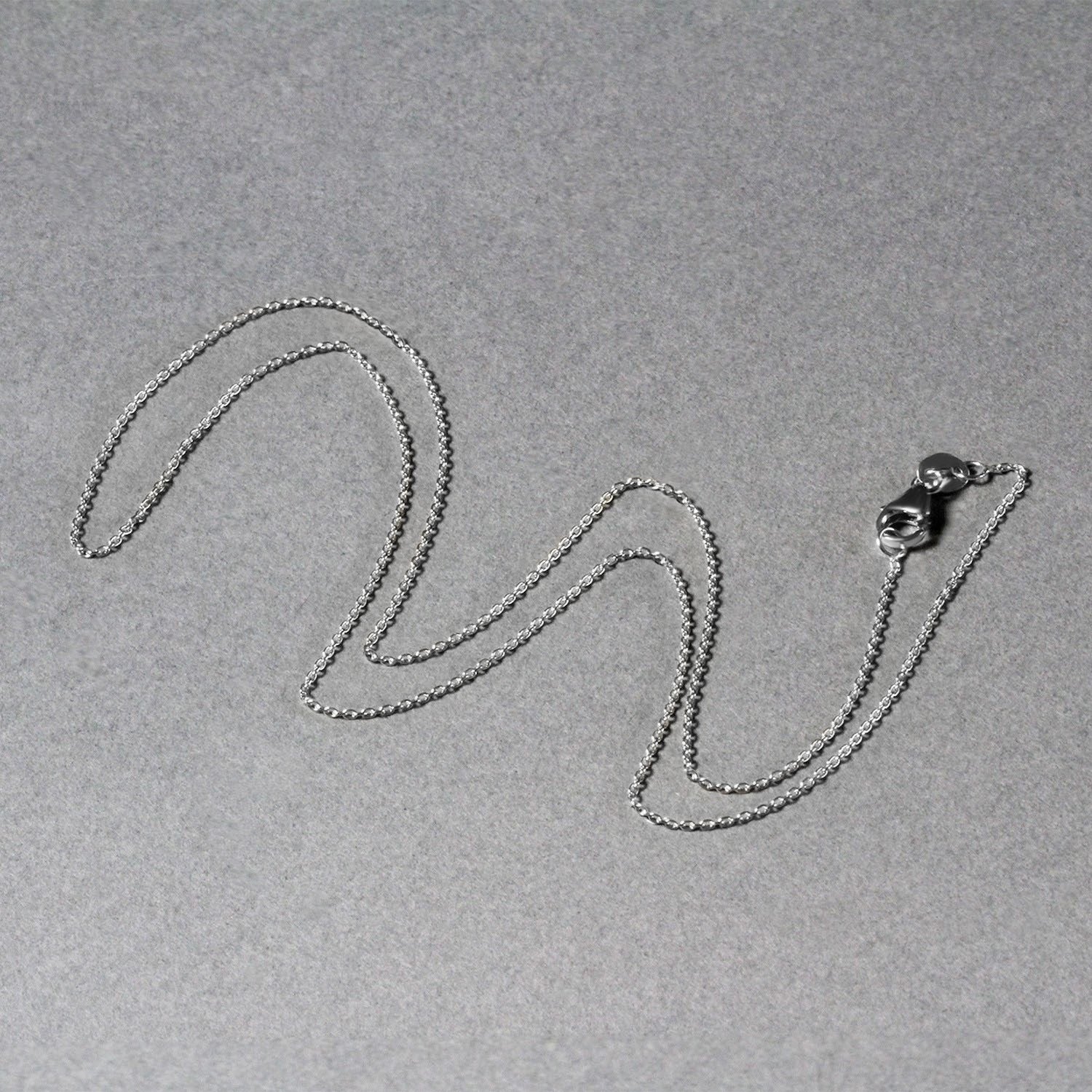 14k witgouden ovale kabelschakelketting (0,97 mm)