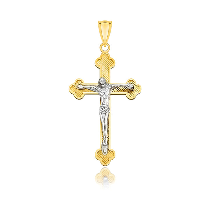 Pendentif croix miniature en or bicolore 14 carats avec motif.