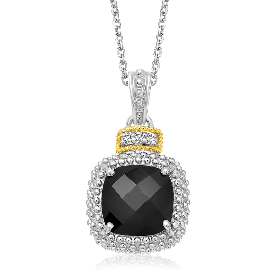 Pendentif en or jaune 18 carats et argent sterling, orné d'un coussin en onyx noir et de diamants.
