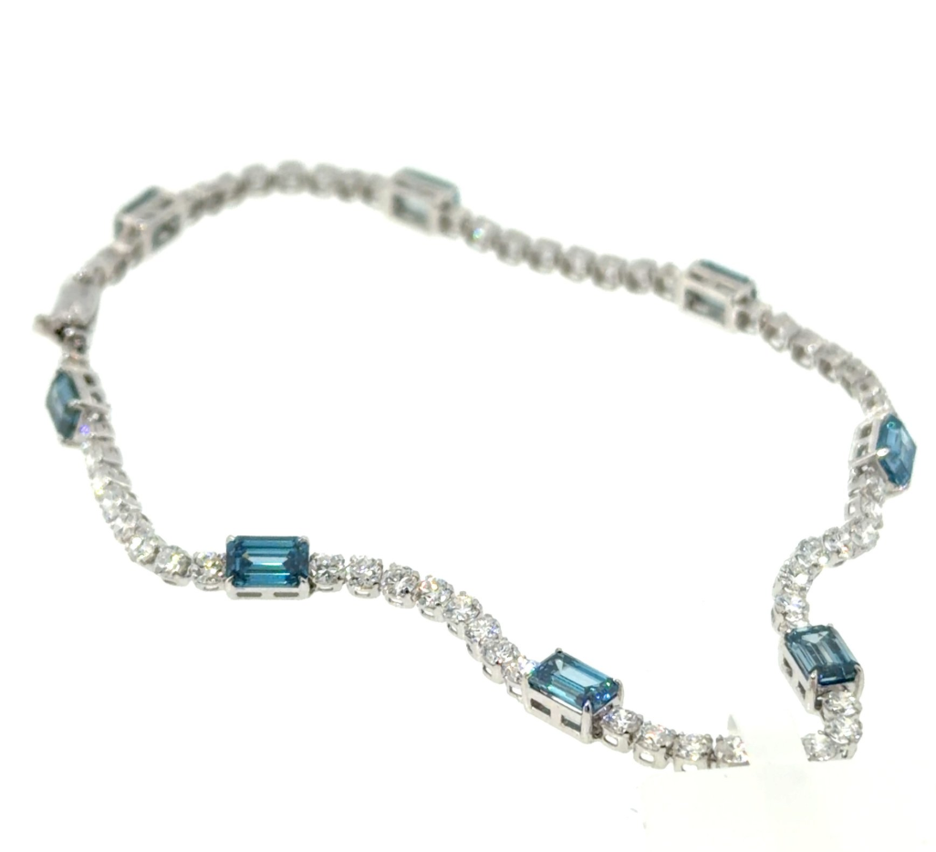 Exclusieve 14 karaat witgouden tennisarmband met 3,79 ct Fancy Vivid Blue lab-grown diamanten – IGI gecertificeerd